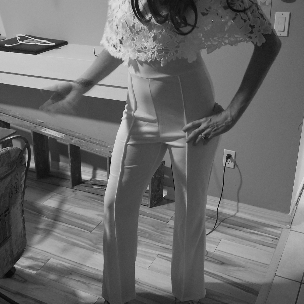 Trendy,  classy white jumpsuit.  Beautiful
